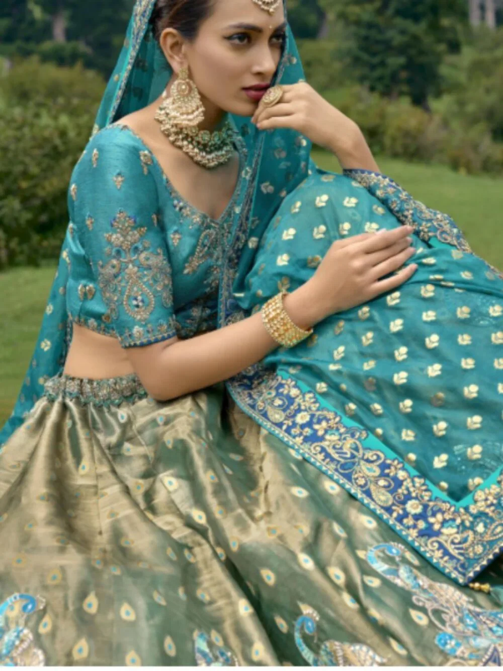 OPULENT GOLD CIRCULAR LEHENGA SET IN PURE KANJIVARAM WITH FIROZI BLOUSE AND DUPA